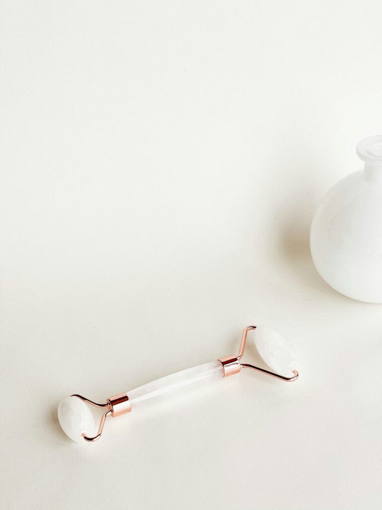 white face roller laid on a white table
